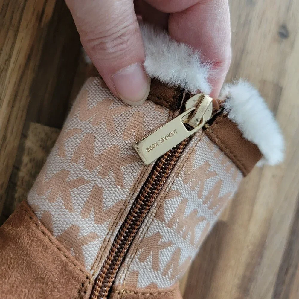 Michael Kors Yancy Girl Toddler boots featuring a brown logo print and faux fur